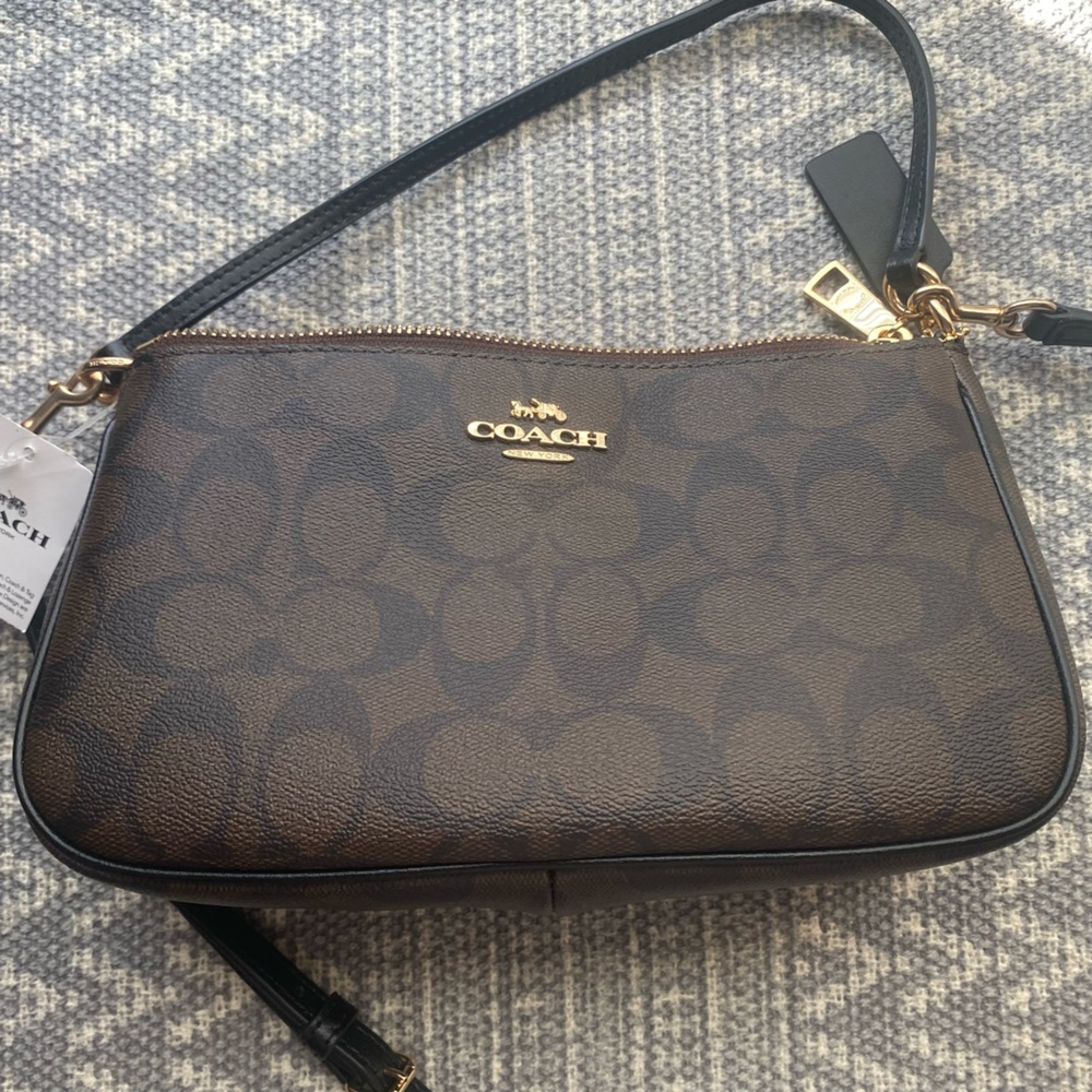 Coach brown with black top handle pouch NWT